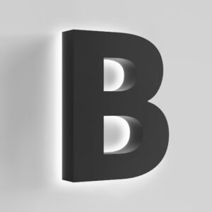 Halo lit channel letter B with a solid dark face and light glowing behind it