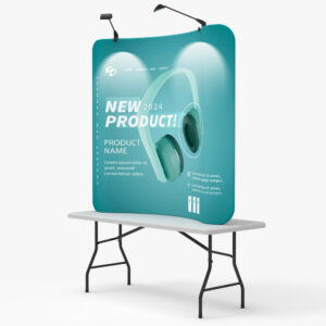 Curved tension fabric tabletop display with two clip-on lights